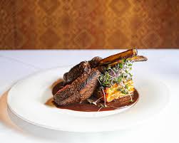 Painted Pony Restaurant signature dishes Bacon Wrapped Almond Stuffed Dates
Lamb Chops
Grilled Ribeye